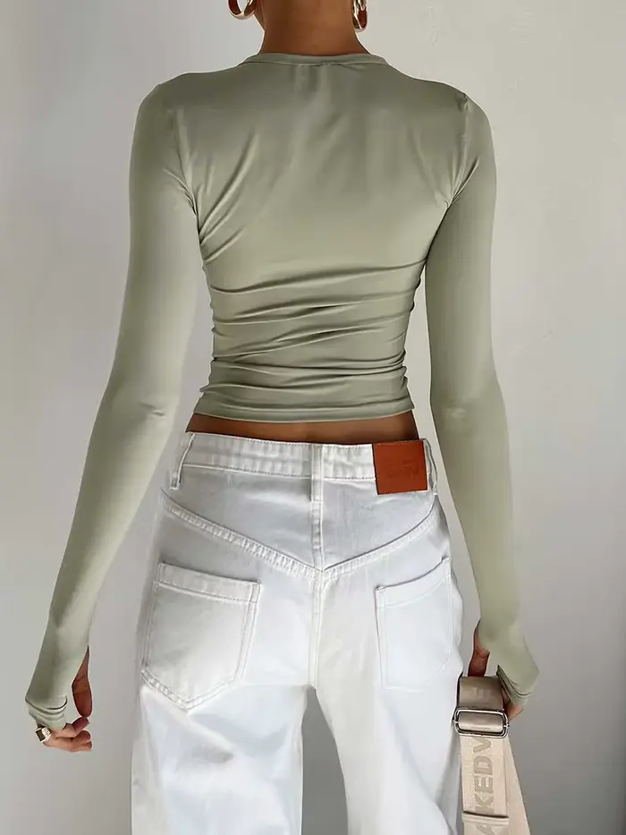Mode femmes T-shirt à manches longues col rond solide coupe ajustée dames haut court avec trous pour