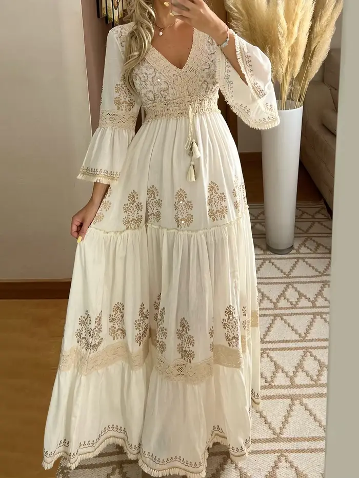 Elegantní dámské dlouhé šaty s třásněmi