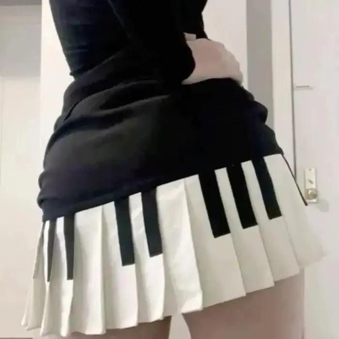 Printemps noir blanc épissé femmes jupe courte Y2k conception mince Harajuku Mini jupe femme Empire