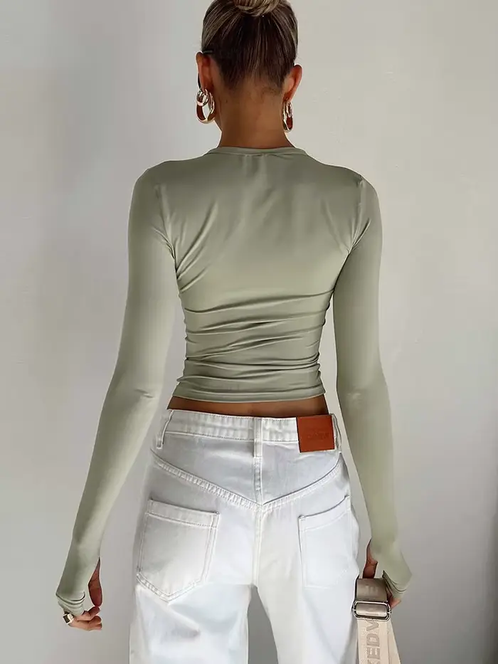 Mode femmes T-shirt à manches longues col rond solide coupe ajustée dames haut court avec trous pour