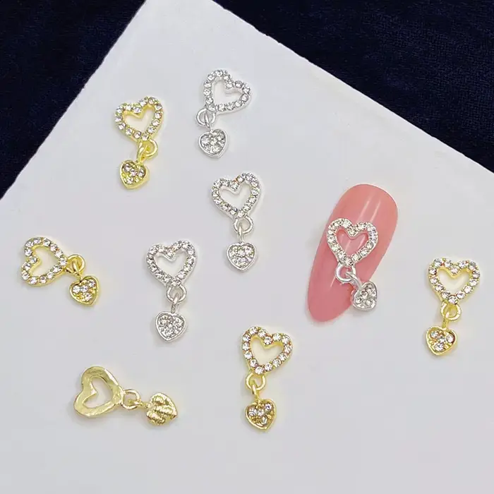 10 pièces coeur balancent ongles breloques 3D alliage luxe ongles strass argent or creux coeur ongle