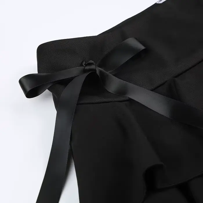Mini-jupe noire à volants avec bordure en dentelle et nœud en ruban, micro-jupe trapèze pour femme, 