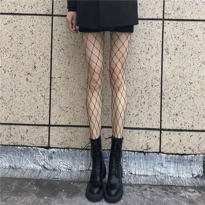 Femmes chaudes longues Sexy évider résille bas collants noir taille haute bas collants culotte résil