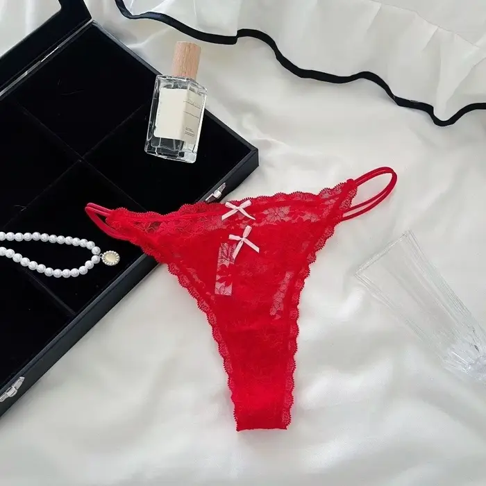Culotte string transparente en dentelle pour femme, style doux, fines bretelles, sans couture, sous-vêtement en maille avec nœud, pour usage quotidien